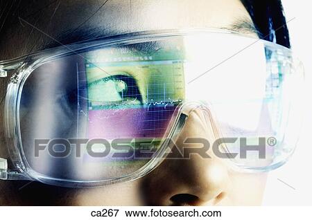 Extreme close-up of a young woman wearing protective eyewear View Large Photo Image Stock Photo - Extreme close-up of a young woman wearing protective eyewear. Fotosearch