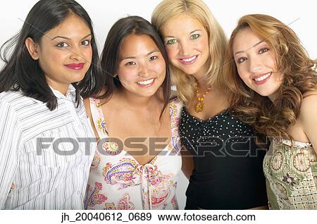 Portrait of a group of young woman standing together smiling View Large Photo Image Stock Photo - Portrait of a group of young woman standing together smiling. Fotosearch