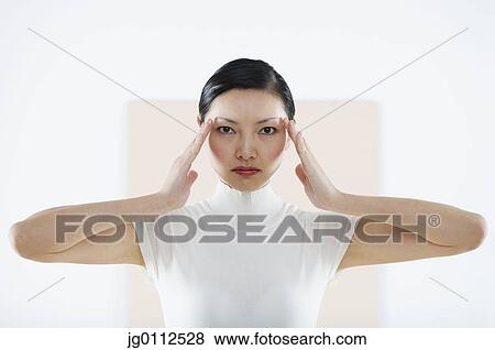 Portrait of a mid adult woman standing View Large Photo Image Stock Photo - Portrait of a mid adult woman standing. Fotosearch