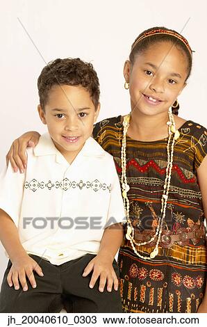 Portrait of a young girl and a young boy together View Large Photo Image Stock Image - Portrait of a young girl and a young boy together. Fotosearch