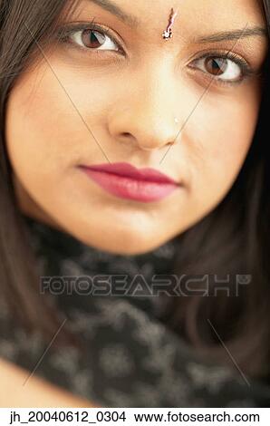 Portrait of a young woman View Large Photo Image Picture - Portrait of a young woman. Fotosearch