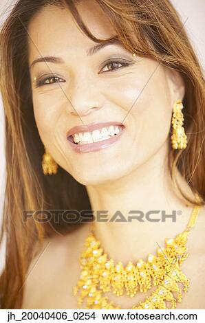 Picture - Portrait of a young woman smiling. Fotosearch
