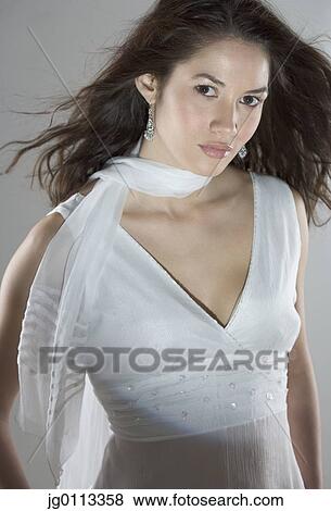 Stock Photo - Portrait of a young woman. Fotosearch