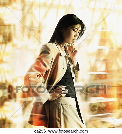 Side profile of a businesswoman thinking View Large Photo Image Stock Photograph - Side profile of a businesswoman thinking. Fotosearch