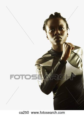 Stock Image - Young woman running. Fotosearch