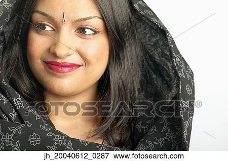 Young woman smiling View Large Photo Image Stock Photo - Young woman smiling. Fotosearch