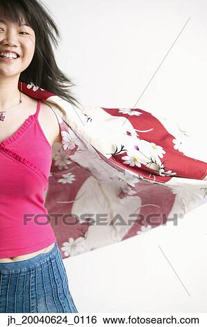 Stock Photograph - Young woman smiling. Fotosearch