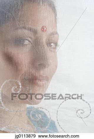 Close-up of a mid adult woman smiling View Large Photo Image Stock Photo - Close-up of a mid adult woman smiling. Fotosearch