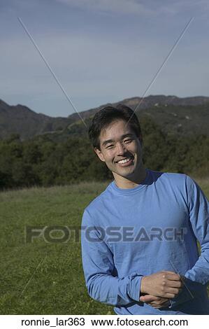 Portrait of a mid adult man smiling View Large Photo Image Stock Image - Portrait of a mid adult man smiling. Fotosearch