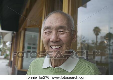 Portrait of a senior man smiling View Large Photo Image Stock Photograph - Portrait of a senior man smiling. Fotosearch