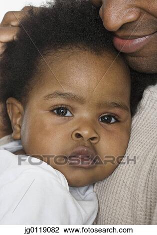 Close up of baby's face View Large Photo Image Stock Image - Close up of baby's face. Fotosearch