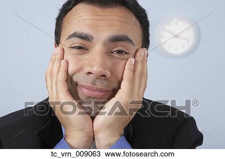 Sleepy businessman at his desk View Large Photo Image Stock Image - Sleepy businessman at his desk. Fotosearch