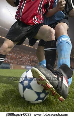 Soccer player stealing the ball View Large Photo Image Stock Image - Soccer player stealing the ball. Fotosearch