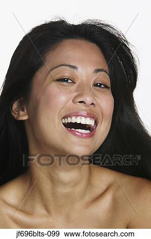 Stock Photo - Young woman laughing. Fotosearch