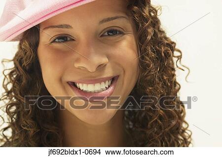 Young woman posing for the camera View Large Photo Image Picture - Young woman posing for the camera. Fotosearch