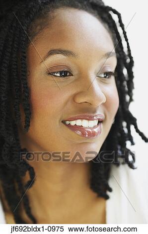 Stock Photography - Young woman smiling. Fotosearch