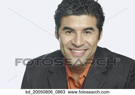 Businessman smiling for the camera View Large Photo Image Stock Image - Businessman smiling for the camera. Fotosearch