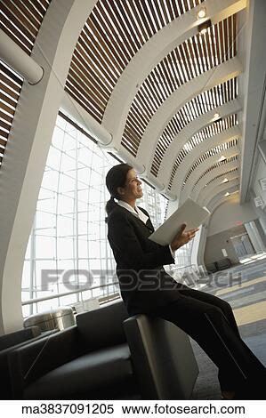 Businesswoman with paperwork in conference room View Large Photo Image Stock Photography - Businesswoman with paperwork in conference room. Fotosearch
