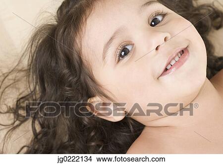 Close up portrait of little girl smiling View Large Photo Image Picture - Close up portrait of little girl smiling. Fotosearch
