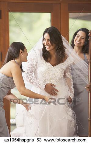 Friends helping bride get into dress View Large Photo Image Stock Image - Friends helping bride get into dress. Fotosearch