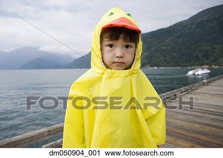 Portrait of boy in ducky raincoat View Large Photo Image Stock Image - Portrait of boy in ducky raincoat. Fotosearch