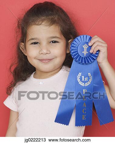 Portrait of girl holding blue ribbon View Large Photo Image Stock Image - Portrait of girl holding blue ribbon. Fotosearch