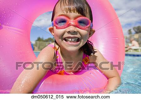 Portrait of girl in swimming pool wearing goggles View Large Photo Image Stock Photography - Portrait of girl in swimming pool wearing goggles. Fotosearch