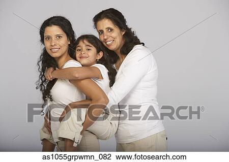 Stock Image - Portrait of grandmother, granddaughter and daughter. Fotosearch