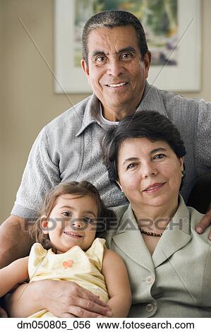 Portrait of grandparents with granddaughter View Large Photo Image Stock Photograph - Portrait of grandparents with granddaughter. Fotosearch