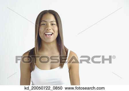 Teenage girl laughing for the camera View Large Photo Image Stock Image - Teenage girl laughing for the camera. Fotosearch