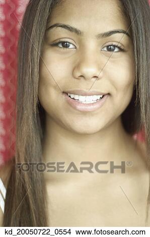 Teenage girl smiling for the camera View Large Photo Image Picture - Teenage girl smiling for the camera. Fotosearch
