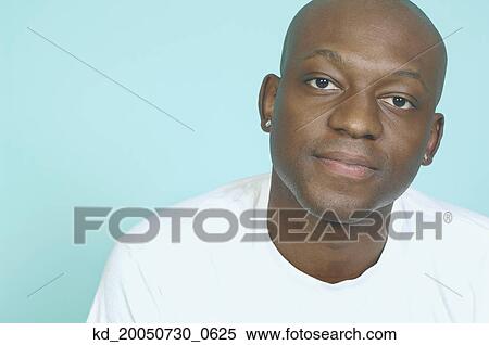 Young man smiling for the camera View Large Photo Image Stock Photography - Young man smiling for the camera. Fotosearch