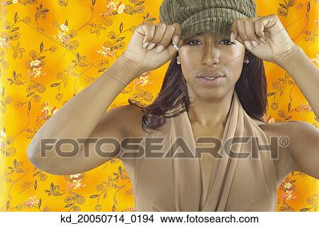 Picture - Young woman posing for the camera. Fotosearch