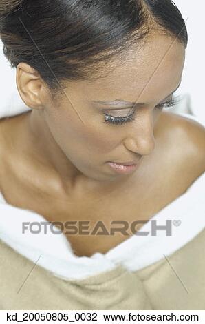 Young woman posing for the camera View Large Photo Image Stock Image - Young woman posing for the camera. Fotosearch