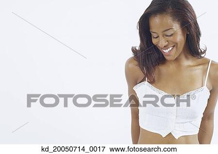 Stock Photo - Young woman posing for the camera. Fotosearch