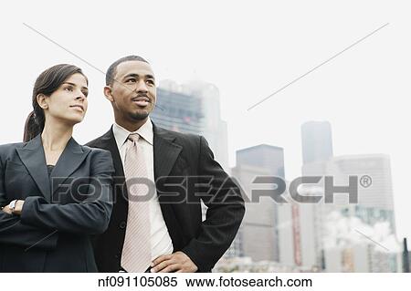 Businesspeople posing for the camera View Large Photo Image Stock Photography - Businesspeople posing for the camera. Fotosearch