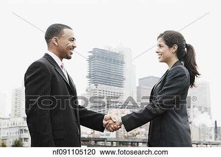 Businesspeople shaking hands View Large Photo Image Stock Image - Businesspeople shaking hands. Fotosearch