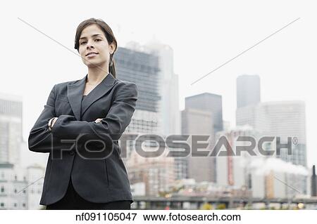 Businesswoman smiling for the camera View Large Photo Image Stock Photo - Businesswoman smiling for the camera. Fotosearch