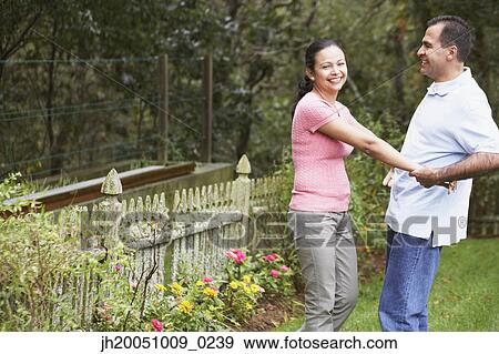 Couple dancing outdoors View Large Photo Image Stock Photo - Couple dancing outdoors . Fotosearch