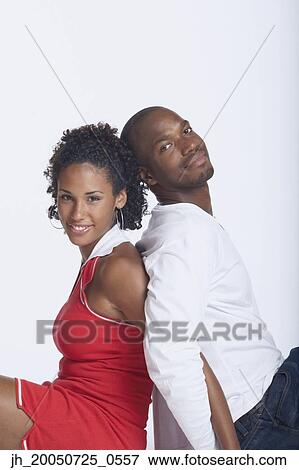 Couple posing for the camera View Large Photo Image Stock Photo - Couple posing for the camera. Fotosearch