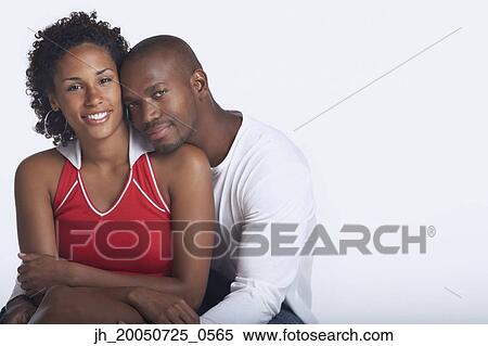 Couple posing for the camera View Large Photo Image Stock Photography - Couple posing for the camera. Fotosearch
