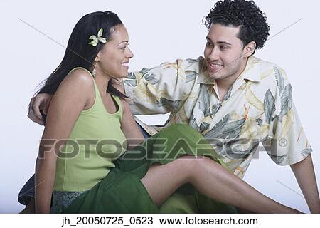 Couple smiling at each other View Large Photo Image Stock Image - Couple smiling at each other. Fotosearch