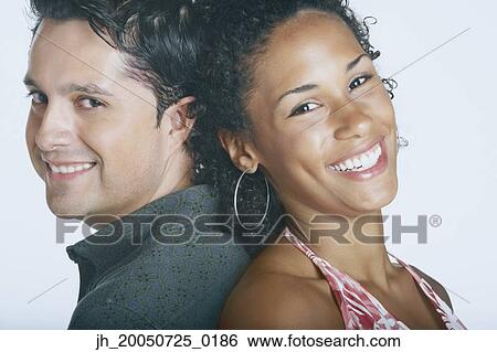Stock Photograph - Couple smiling for the camera. Fotosearch