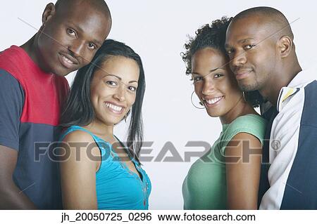 Stock Photograph - Couple smiling for the camera together. Fotosearch