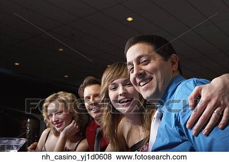 Stock Photo - Friends smiling for the camera. Fotosearch