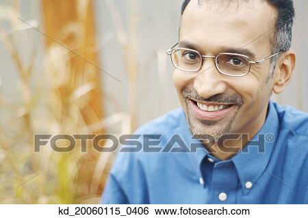 Stock Photograph - Man smiling for the camera. Fotosearch
