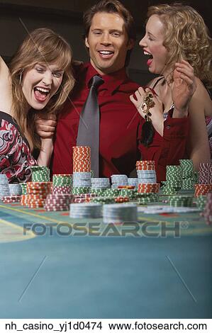 Man successfully gambling in a casino View Large Photo Image Picture - Man successfully gambling in a casino. Fotosearch