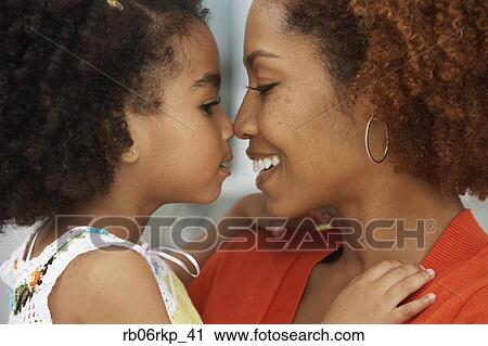 Mother and daughter touching noses View Large Photo Image Stock Image - Mother and daughter touching noses. Fotosearch