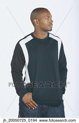 Young man posing for the camera View Large Photo Image Picture - Young man posing for the camera. Fotosearch