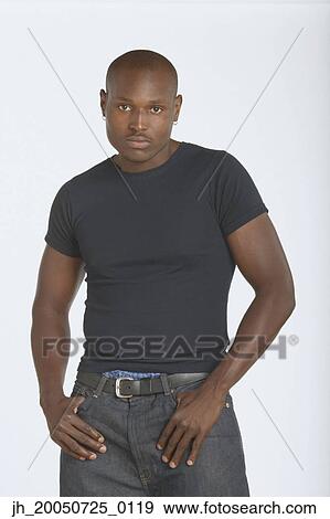 Stock Photo - Young man smiling for the camera. Fotosearch